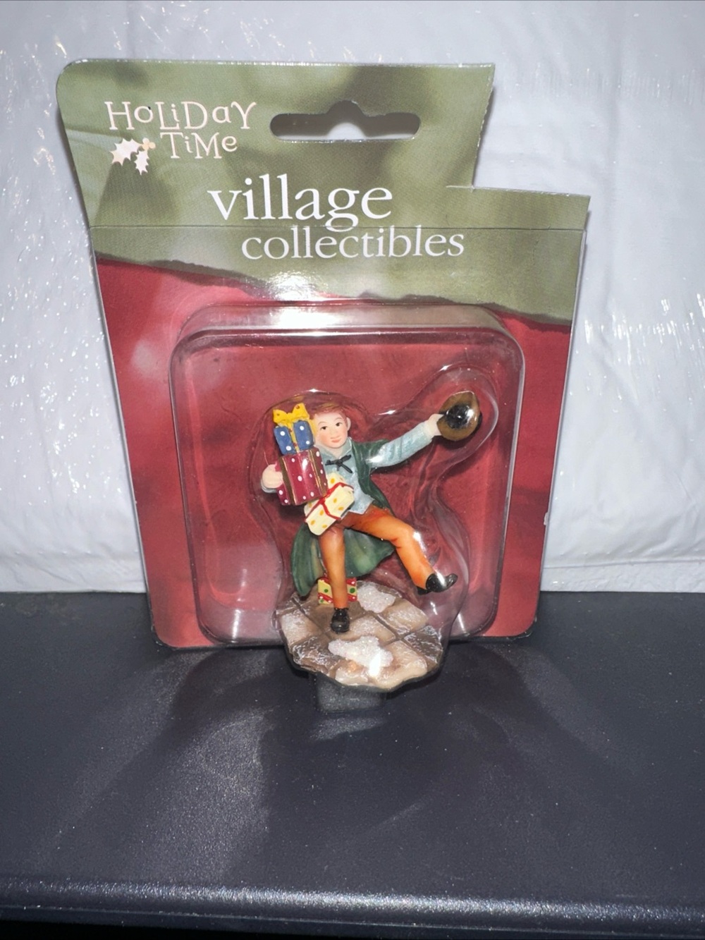 Holiday Time Figurine - Green Coat, Orange Pants, Red and Blue Gifts
